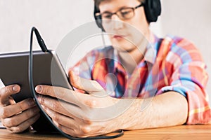 Tablet in hands closeup