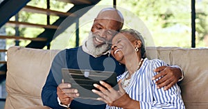 Tablet, hug and senior couple on a sofa for web communication, network or chat at home. Digital, app and old people