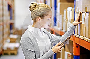 Tablet, label or woman in warehouse for shipping delivery, box shelf and stock in factory for storage. Printing