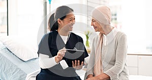 Tablet, nurse and woman with cancer patient in hospital, consultation and wellness. Technology, happy and medical
