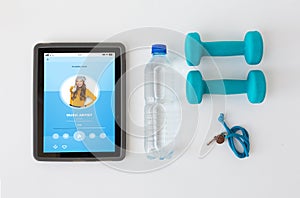 Tablet pc, dumbbells, whistle and water bottle