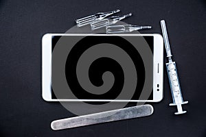 Tablet pc with medical objects on a desk