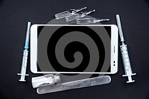 Tablet pc with medical objects on a desk