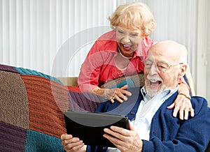 Tablet PC - Senior Couple Laughing