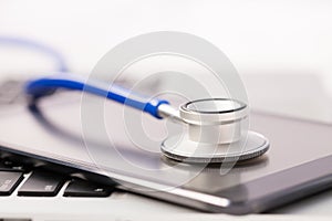 Tablet / Phablet being diagnosed by stethoscope - phone repair a