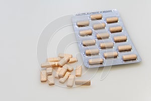 Tablet of pharmaceutical tablets on white background