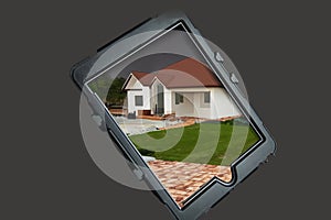 Tablet prodected with a high impact case with an image of a dream home with a lawn