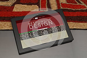 Tablet with responsive web site of coffee theme.