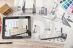 Tablet showing bedroom plans in finished room. Modern apartment. Technical drawing. Home interior design, sketch