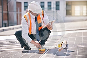 Tablet, solar panels and engineering man on rooftop, city and urban development, sustainability or energy saving