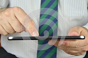 Tablet used by a businessman