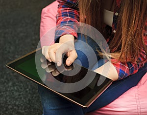 Tablet in woman hand