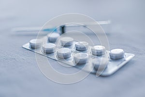 tabletes and syringe