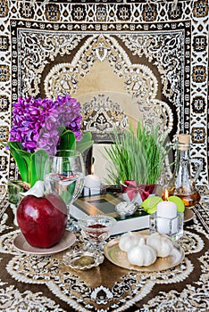 Tabletop with Haft-seen elements for Nowruz photo