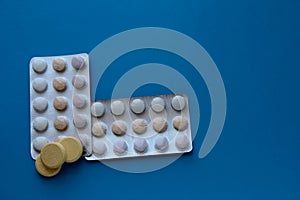 Tablets on a blue background. Children`s vitamins