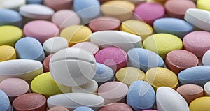 Tablets of different colors. Antibiotic resistance. Tablets from antimicrobial viruses. Pharmaceutical industry