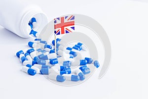 Tablets and the flag of Britain. Import of tablets to Britain.