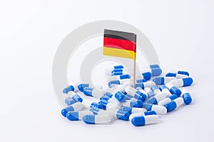 Tablets and the flag of Germany. Import of tablets to Germany.