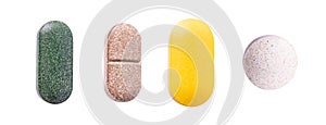 Tablets set of supplements, vitamins and medication. Nutrition pills, healthy natural medication. Vitamin C, spirulina and biotin