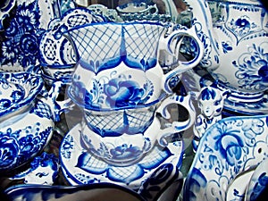 Tableware in the Russian traditional Gzhel style. Teacups with saucer. Gzhel-Russian folk craft for making ceramics