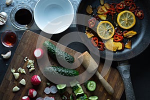 Tableware and vegetables for making sushi top view