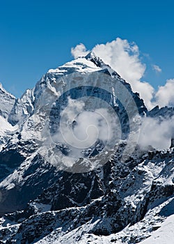 Taboche mountain peak and clouds viewed from Renjo pass