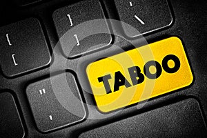 Taboo is a ban on something based in a cultural sensibility, sacred, or allowed only by certain persons, text button on keyboard, photo