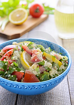 Tabouli salad in blue bowl