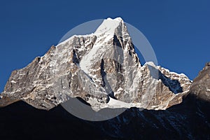 Tabuche peak and Cholatse peak - beautiful Himalayan mountains around the way to Everest base camp, Khumbu valley, Solukhumbu,