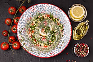 Tabule - oriental salad, next to the ingredients photo