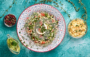 Tabule - an oriental salad, next to the ingredients photo