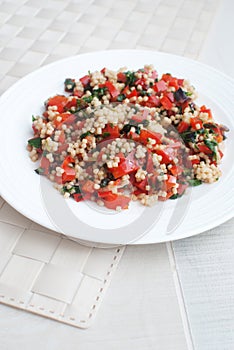 Tabule or pasta salad with bell pepper photo