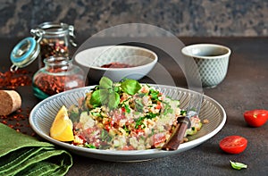 Tabule - a traditional oriental salad with vegetables photo