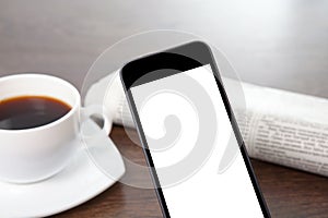 Tach phone with isolated screen on a table at a businessman