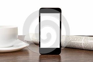 Tach phone with isolated screen on a table at a businessman