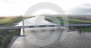Tacitusbrug bij Ewijk modern suspension bridge crossing the river Waal near Nijmegen, the Netherlands Holland Europe