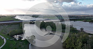 Tacitusbrug bij Ewijk modern suspension bridge crossing the river Waal near Nijmegen, the Netherlands Holland Europe