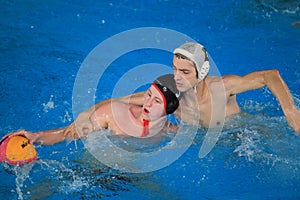 Tackle in water polo