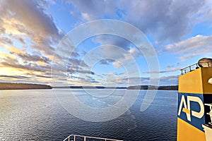 Tacoma, WA, USA, October, 23-25, 2019. Repainting the shipÃ¢â¬â¢s funnel and drawing the logo of the shipowner with m