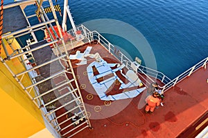 Tacoma, WA, USA, October, 23-25, 2019. Repainting the shipÃ¢â¬â¢s funnel and drawing the logo of the shipowner with m