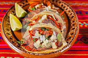 Tacos al pastor and lemon mexican spicy food in mexico city photo