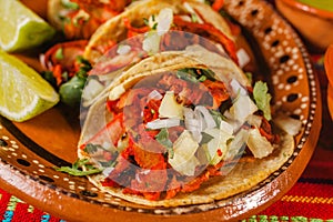 Tacos al pastor and lemon mexican spicy food in mexico city photo