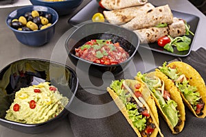 Tacos with beef and salsa and guacamole
