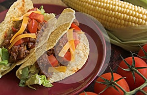 Tacos with corn and tomatoes