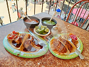 Tacos with hot sauce in Mexico. Traditional food.