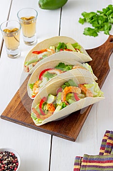 Tacos with shrimp, avocado and salad. Mexican food