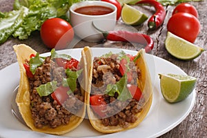 Tacos stuffed with ground beef and chili