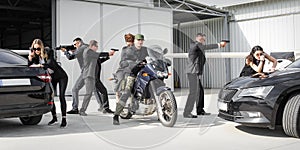 Tactical exercise training. An armed bodyguard security team protects celebrity