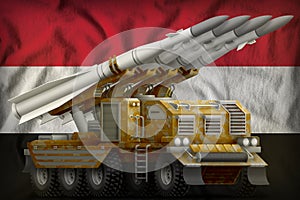 Tactical short range ballistic missile with sand camouflage on the Egypt national flag background. 3d Illustration