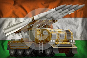 Tactical short range ballistic missile with sand camouflage on the Niger national flag background. 3d Illustration